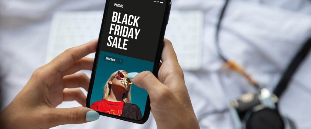 Someone browsing a Black Friday sale on their phone