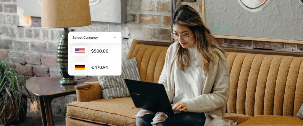 Women looking at her laptop with currency options pop up