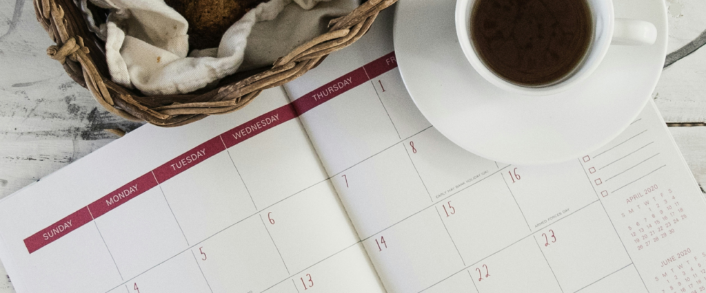 Image of a calendar and a cup of coffee